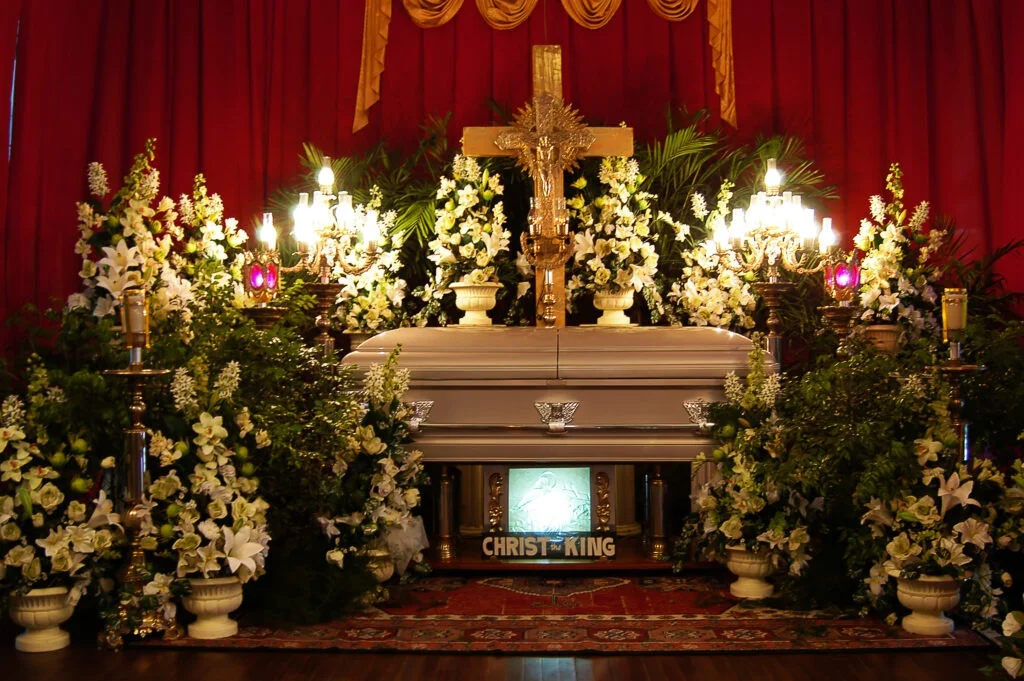 A traditional Filipino funeral flower assortment, including casket flowers and sympathy flowers
